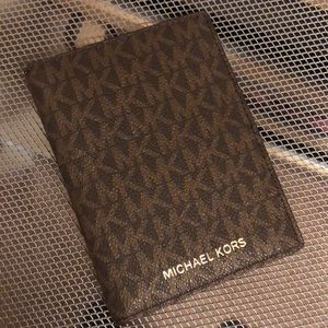 Brand new Michael Kors passport wallet